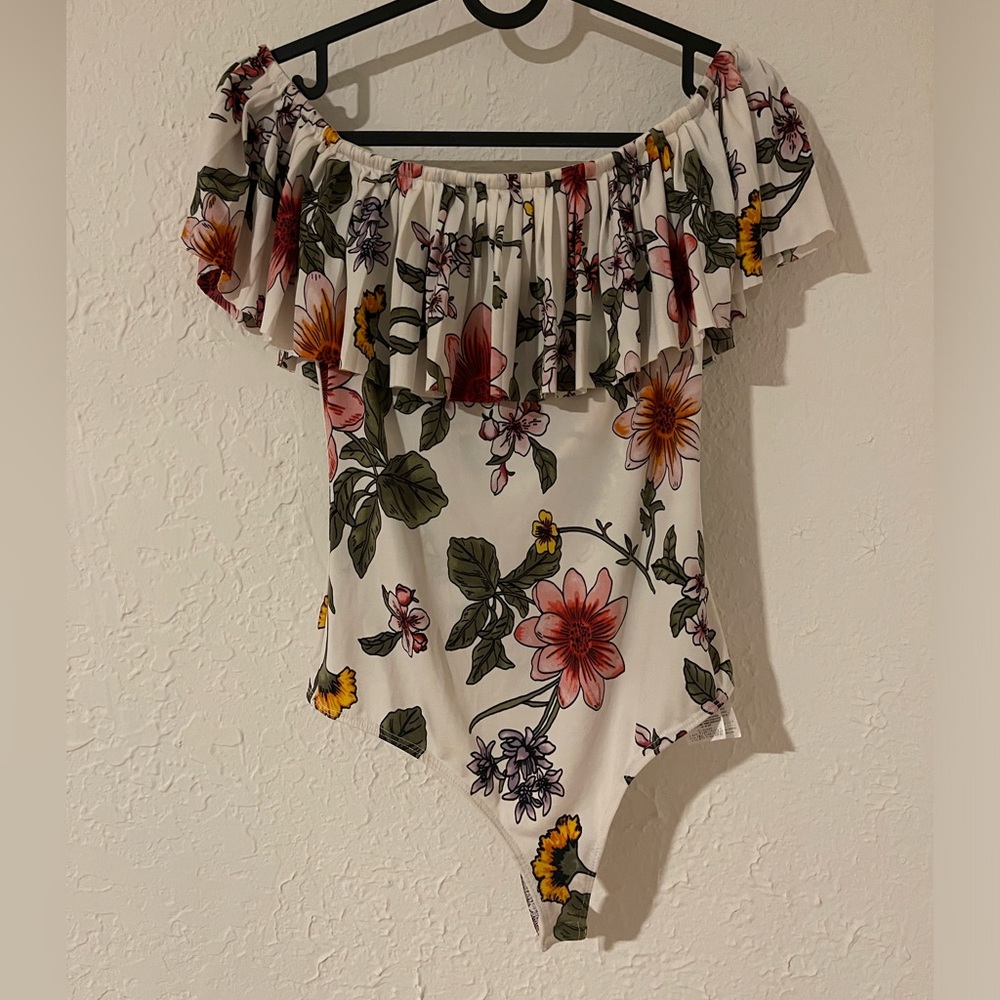 Guess floral bodysuit with snap bottom